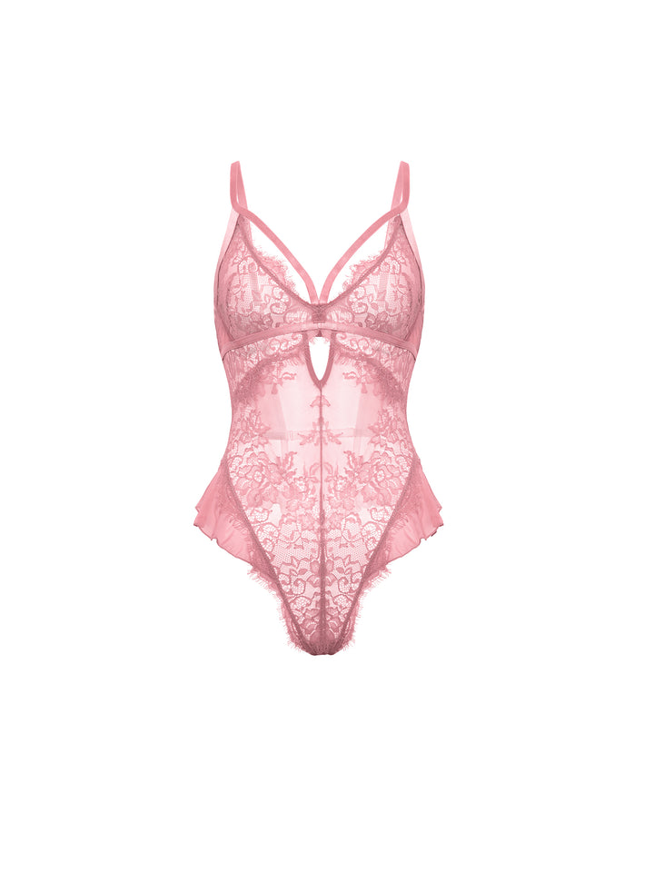 Flora Sheer Lace Teddy by Oh La La Cheri in soft pink, featuring lace and mesh with ruffles and a unique back design.