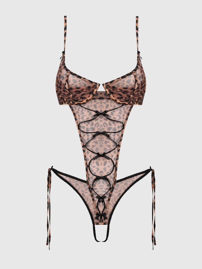 Alia Leopard Mesh Crotchless Teddy in sheer leopard print, featuring criss-cross ribbon details and a daring design.