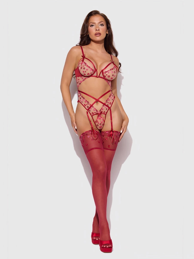 Angelina Lips Embroidery Cutout Teddy in red, featuring bold cuts, lace trim, and seductive garter straps.