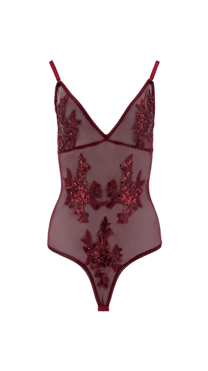 Urania bodysuit in red wine with sequins appliqué and stretch mesh for a figure-hugging fit.