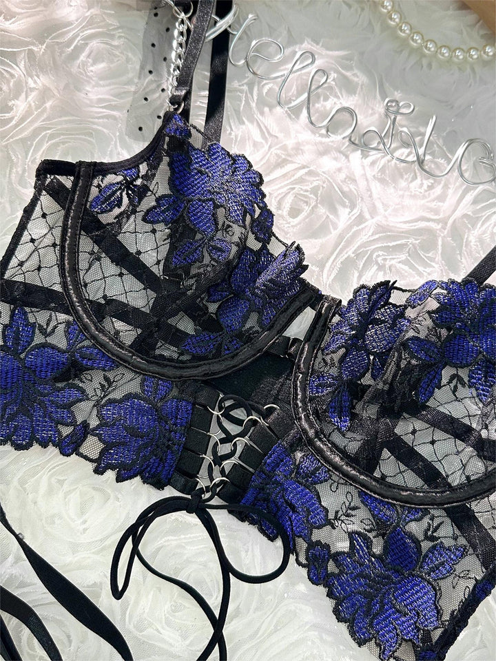 Freya Sculpting Bustier and Thong Set by Hello.L.A.Girl with black mesh and blue floral embroidery details.