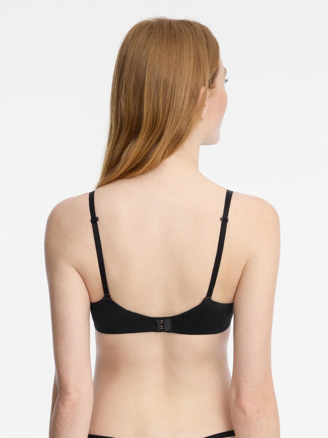 Back view of the black Insider Convertible T-Shirt Bra featuring adjustable straps for comfort and support.