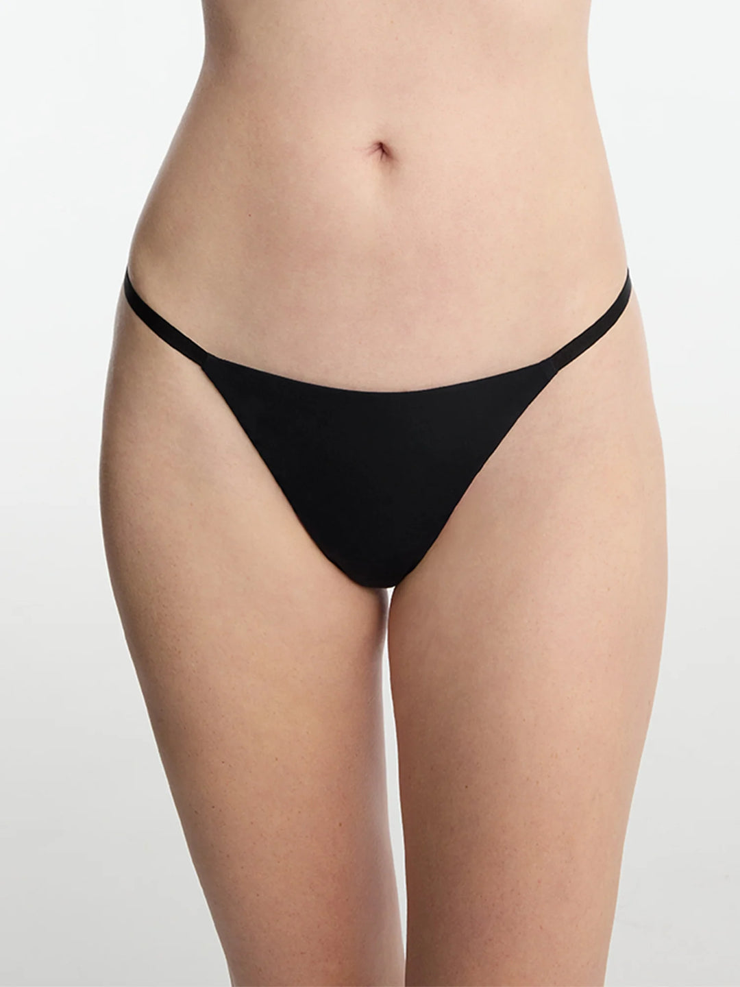Insider Seamless G-String Thong in black, designed for minimal coverage and maximum comfort with a sleek, seamless look.