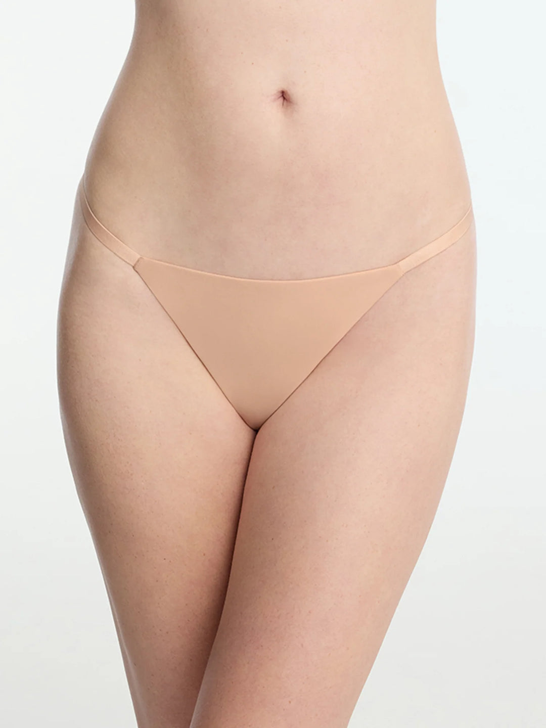Insider Seamless G-String Thong in nude, designed for minimal coverage and maximum comfort under clothes.