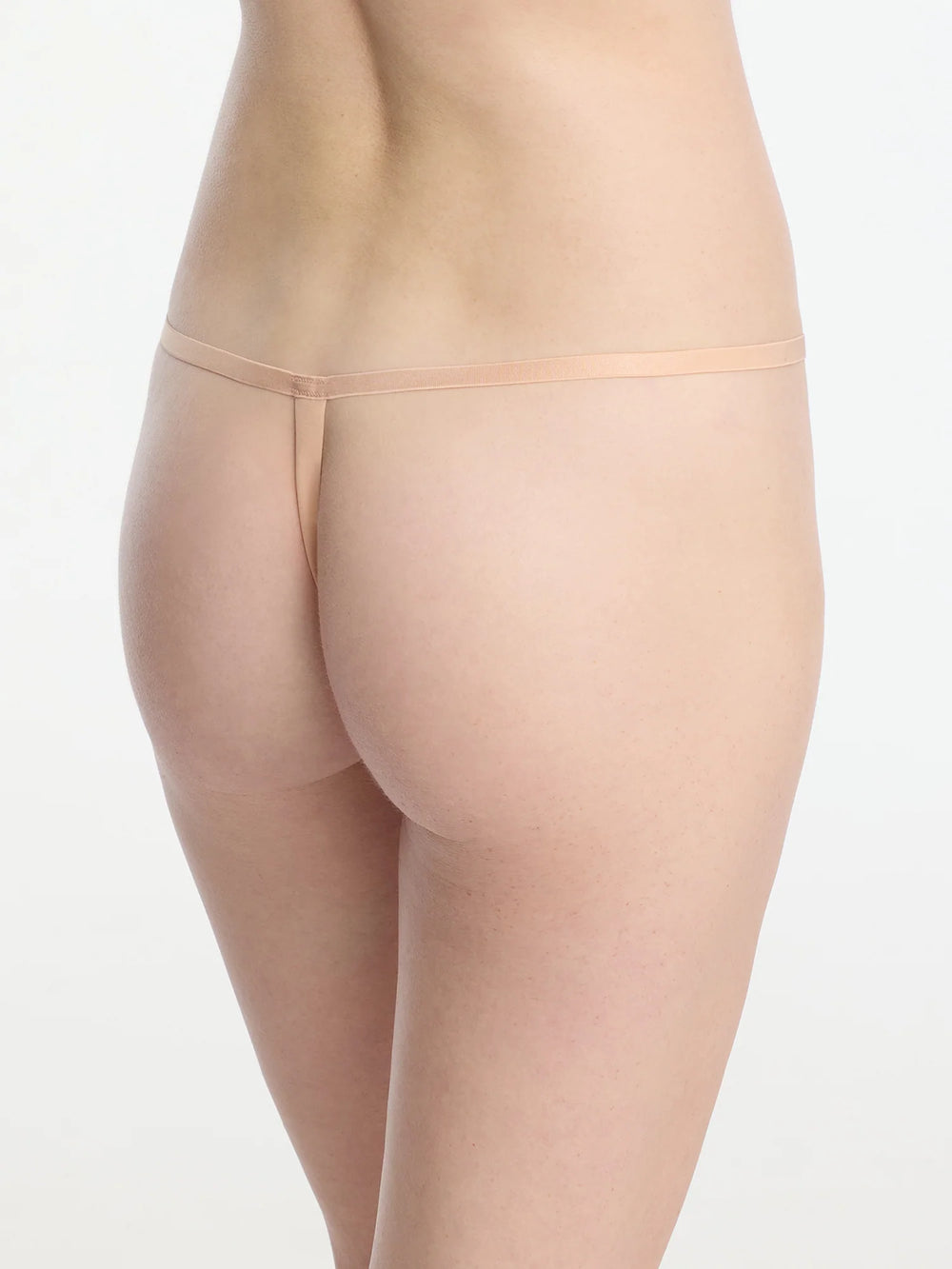 Insider Seamless G-String Thong in nude, showcasing minimal coverage and a seamless design for ultimate comfort.