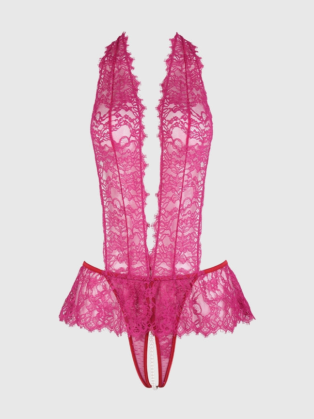 Jocelyn Lace & Pearl Crotchless Teddy in pink lace by House of Desire, luxury lingerie with plunging neckline and open-crotch design.