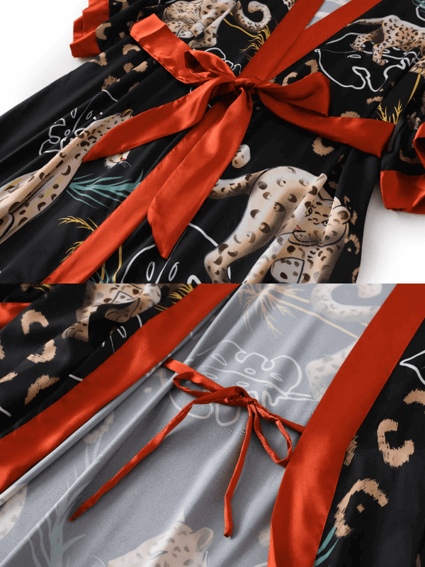 Jungle Animals Kimono Robe featuring luxurious fabric with vibrant jungle animal prints and a stylish red belt.