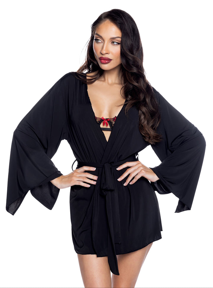 Woman wearing a soft modal black short robe.