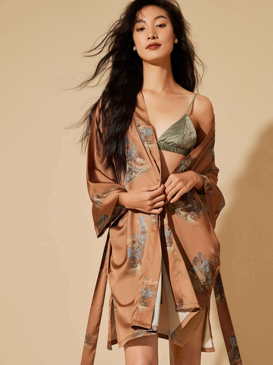 Model wearing a Short Kimono Robe Landscape with floral prints, showcasing luxury and elegance in soft fabric.