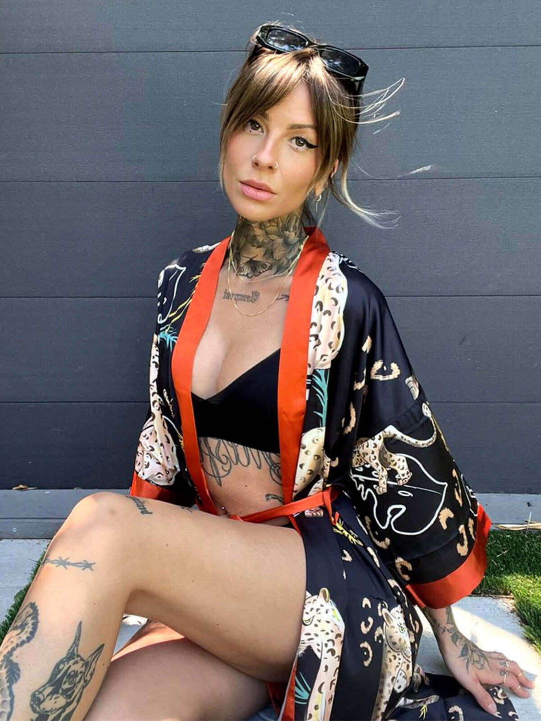 Model wearing Jungle Animals Kimono Robe, showcasing luxurious fabric and vibrant jungle animal prints.