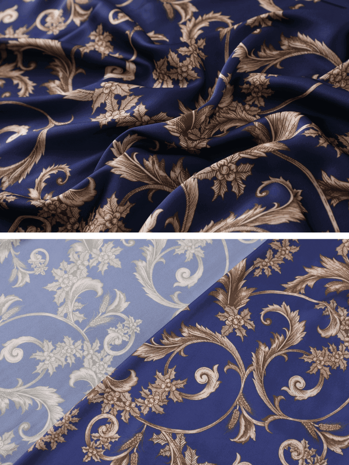 Close-up of luxurious blue fabric with intricate floral embroidery, showcasing the elegance of the Tassels Blue Kimono Robe.
