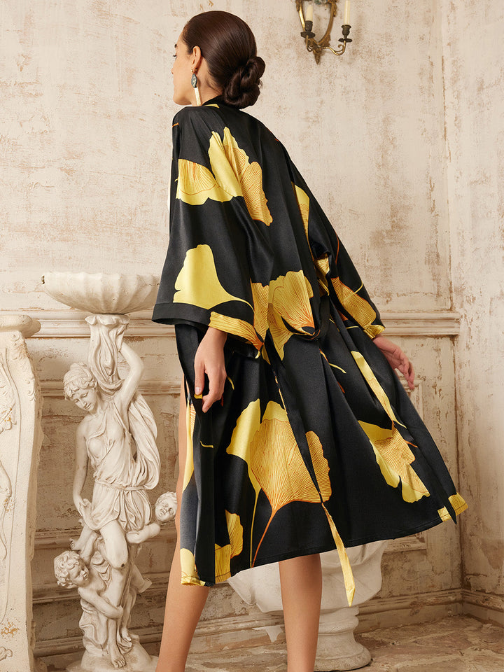 Yellow Ginkgo Leaf Print Black Kimono Robe showcased in a stylish setting with elegant design elements.