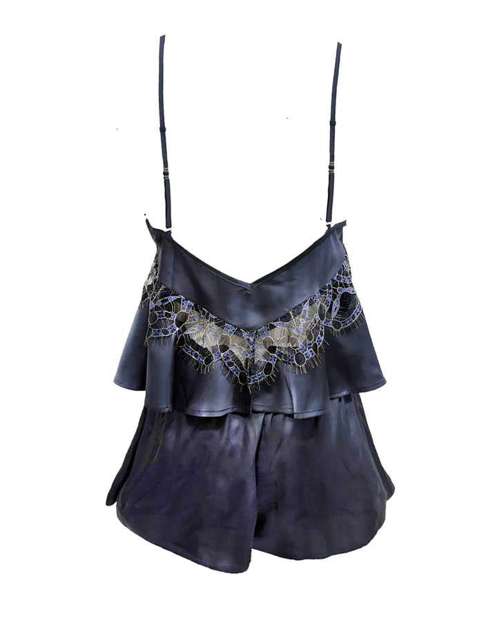 Dark blue lace-trimmed top with ruffled layers on a white background