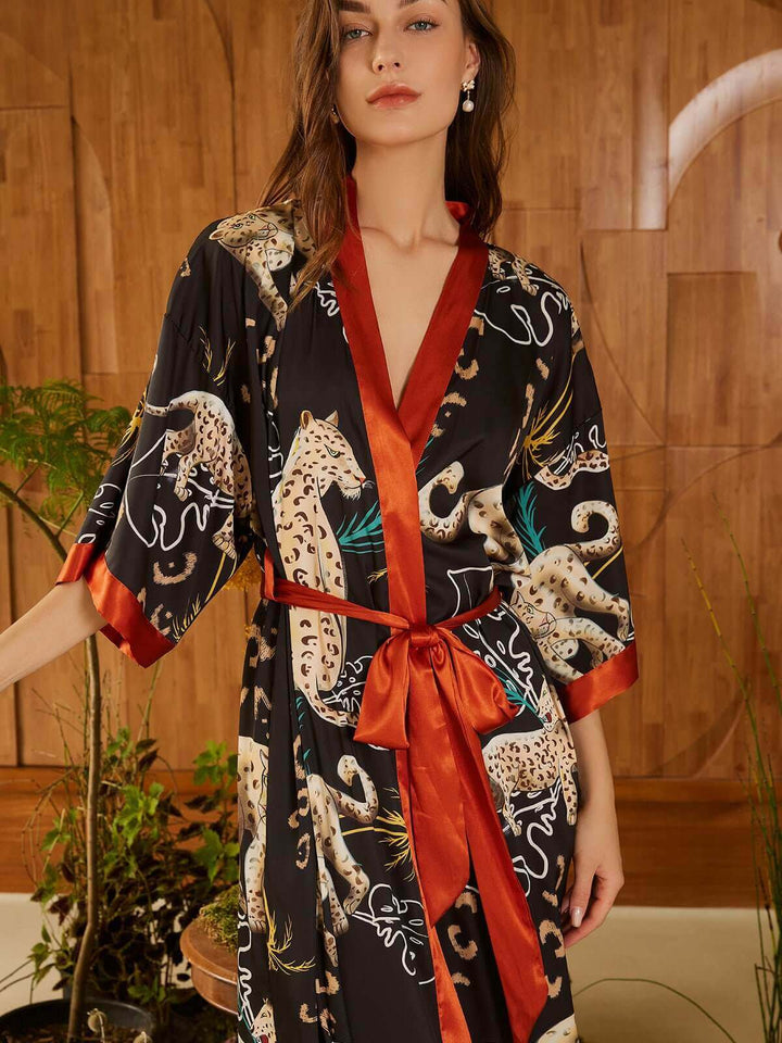 Jungle Animals Kimono Robe featuring hand-painted jungle prints and luxurious silky comfort.