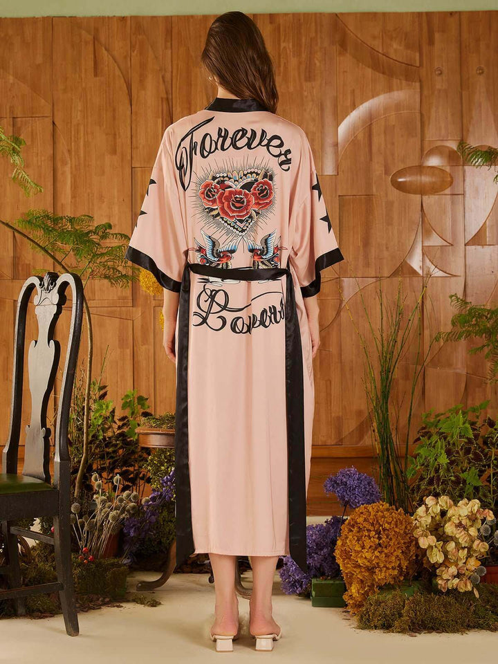 Rose Butterfly Kimono Robe featuring floral prints and text design, showcasing luxury and comfort in elegant style.