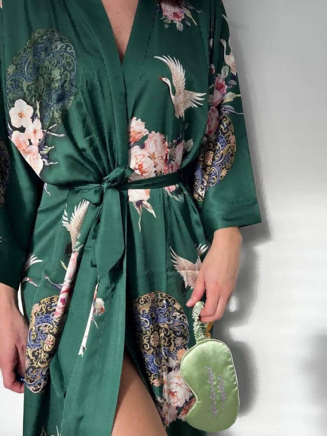 Garden Crane Green Kimono Robe featuring elegant floral designs and luxurious style, with a matching green accessory.