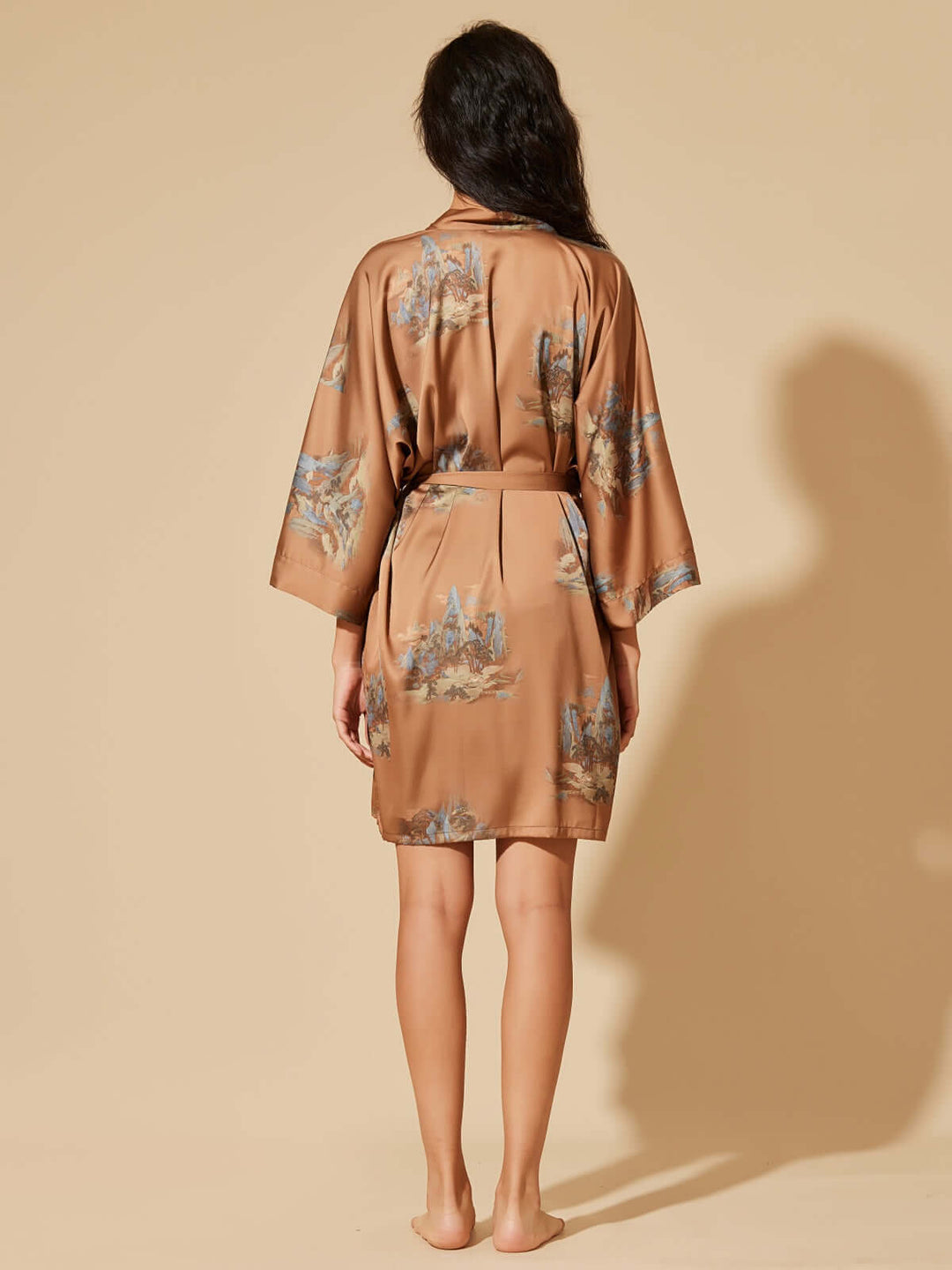 Short Kimono Robe Landscape showcased from the back, featuring stunning landscape prints on luxurious fabric.