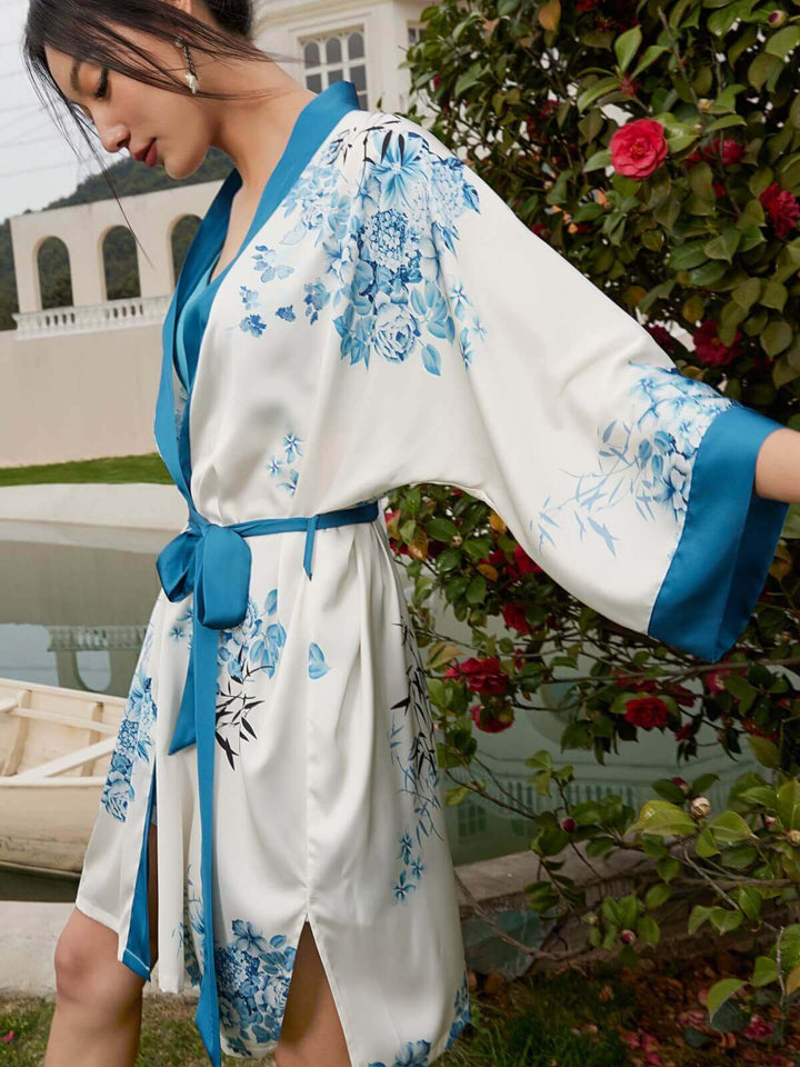 Short Kimono Robe bamboo featuring floral patterns and a blue sash, exemplifying luxury and elegance.
