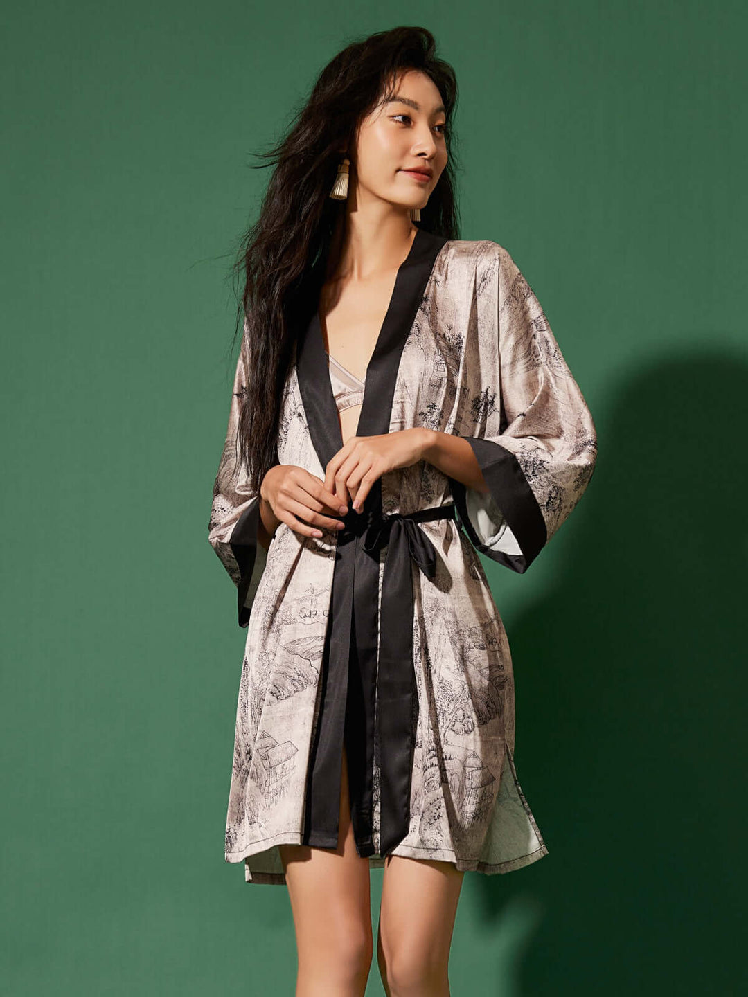 Short Kimono Robe Ink Painting displayed on model against a green background, showcasing luxury and elegance.