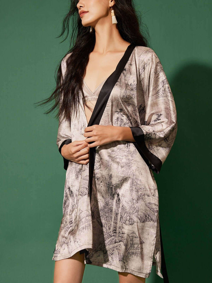 Elegant model showcasing a Short Kimono Robe Ink Painting, featuring silk-like fabric and intricate design.
